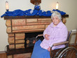 Photo: Senior resting at a fireplace Senior resting at a fireplace