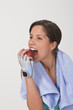 Beautiful young woman bitting a red apple. Beautiful young woman bitting a red apple.