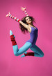 cool girl jumping on the magenta background