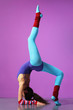 cool girl doing aerobic exercise on a magenta background