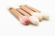 Diagonal applicators on white background Diagonal applicators on white background