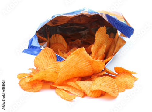 Photo: packet of potato crisps isolated on white background packet of potato crisps isolated on white background