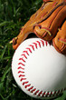 A baseball glove with a baseball