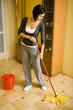 Photo: Woman cleaning floor Woman cleaning floor