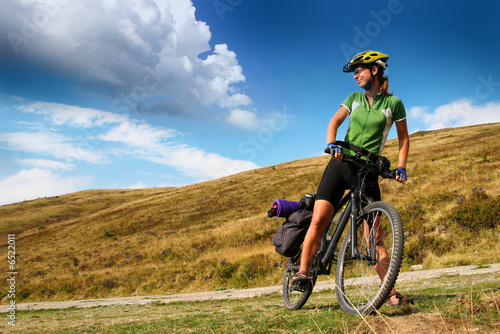 Foto: Cyclist in the mountains Cyclist in the mountains