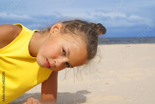 Photo: Preteen girl on beach Preteen girl on beach