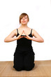 Young woman making yoga- exercises