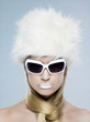 Woman wearing sunglasses and fur hat