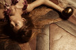 Young woman lying on floor