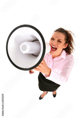 Businesswoman shouting through megaphone