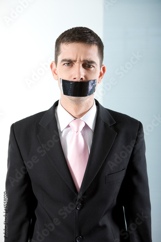 Photo: man with black tape1 man with black tape1