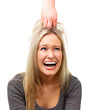 Young womans hair being pulled