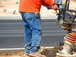 Hand held power compactor in action_1929ER1B1-MAR708 Hand held power compactor in action_1929ER1B1-MAR708