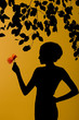 Silhouette of a woman with leaves