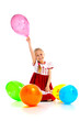 child with balloons