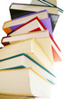 Stack of hardcover books isolated on white