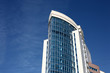 Modern office building over blue sky. Modern office building over blue sky.
