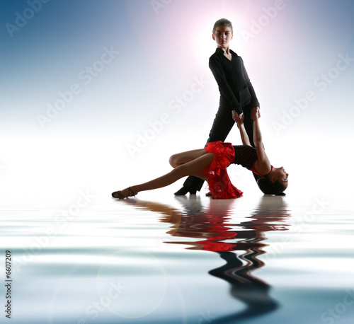 Young dancers in latin dance pose