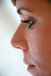 Foto: Woman with tears in her face Woman with tears in her face