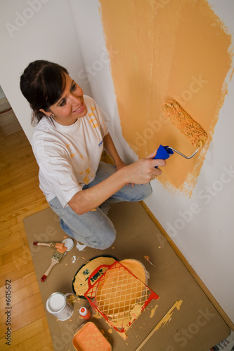 Photo: Woman colours her first flat Woman colours her first flat