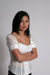 Oriental woman with arms crossed