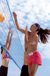 Volleyball game on beach