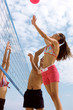 Volleyball game on beach