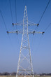 Power line pole on blue sky background