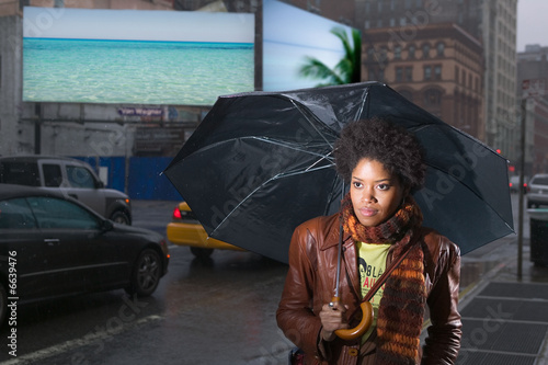 Female pedestrian with umbrella Female pedestrian with umbrella