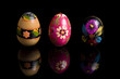 Easter eggs on black mirror, hand painted Easter eggs on black mirror, hand painted
