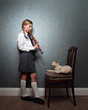 Girl playing recorder to cat