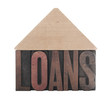 the word 'loans' with a roof shape above the word 'loans' with a roof shape above
