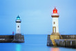 Two lighthouses at a port in belle ile