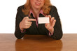Isolated business woman sitting at desk