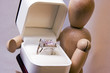 Wood Man Holding Ring in Box Wood Man Holding Ring in Box