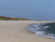 Foto: Sandstrand mit Leuchtturm Sandstrand mit Leuchtturm