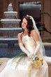 Photo en ligne au meilleur prix Smiling bride in white wedding dress