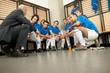 Coach with football team