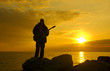 lonely guitarist on the evening beach