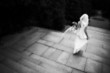 A bride walking away down a staircase