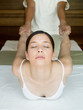 young woman having a thai massage
