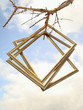 Three frames on background of sky with clouds. Folk creation.