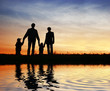 family of four on sunset sky, water family of four on sunset sky, water