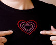 Female Pointing to Heart on Shirt Female Pointing to Heart on Shirt