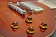 Knob focus on a Les Paul guitar body Knob focus on a Les Paul guitar body