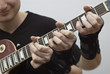 Triple action on a guitar fretboard Triple action on a guitar fretboard