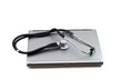 Stethoscope and laptop illustrating concept of digital security