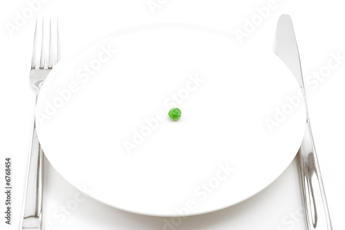 Photo: single pea on a plate single pea on a plate