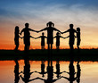silhouette children. sunset pond.