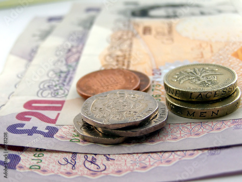 Photo: GBP British Pounds money bank notes and coins GBP British Pounds money bank notes and coins